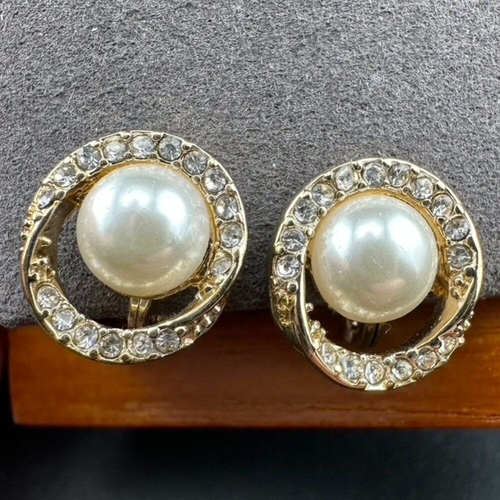 Vintage TJG Gold tone Faux Pearl Pave Rhinestone Twist Clip on Earrings.